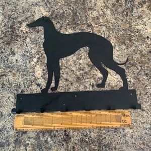 Metal greyhound leash hanger .